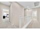 Hallway with carpet flooring leading to the bedrooms at 9413 Aggie Ct, Las Vegas, NV 89148