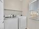 Laundry room with front-load washer and dryer at 9413 Aggie Ct, Las Vegas, NV 89148
