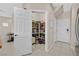 Walk-in pantry with ample shelving for storage at 9413 Aggie Ct, Las Vegas, NV 89148