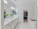 Elegant bathroom with double sinks, a soaking tub, and a separate walk-in closet at 12382 Piazzo St, Las Vegas, NV 89141