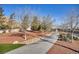 Inviting walking path with desert landscaping, perfect for a morning stroll at 12382 Piazzo St, Las Vegas, NV 89141