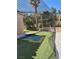 Backyard baseball cage with artificial turf, and other features at 1705 Pink Cliff Ct, Las Vegas, NV 89128