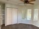 Bedroom with carpet, ceiling fan, closet and natural lighting at 1705 Pink Cliff Ct, Las Vegas, NV 89128