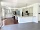 Spacious kitchen with double islands, granite countertops, and stainless steel appliances at 1705 Pink Cliff Ct, Las Vegas, NV 89128