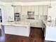 Well-equipped kitchen with granite countertops, stainless steel appliances, and ample cabinet space at 1705 Pink Cliff Ct, Las Vegas, NV 89128