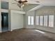 Large living room with carpet, many windows and natural light at 1705 Pink Cliff Ct, Las Vegas, NV 89128