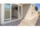 Private back patio with paver stones, a privacy wall, and access to the interior of the home at 1803 Potosi Peak Ave, North Las Vegas, NV 89031