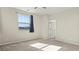 Comfortable bedroom featuring carpet, ample natural light and an open closet at 1803 Potosi Peak Ave, North Las Vegas, NV 89031