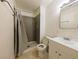 Bathroom with a tiled shower and standard fixtures at 1912 W Carey Ave, North Las Vegas, NV 89032