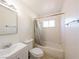 Bathroom with a tub and a shower combination and standard fixtures at 1912 W Carey Ave, North Las Vegas, NV 89032