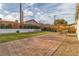 Large patio with gravel ground cover and artificial turf offering comfortable outdoor space at 239 N Bruce St, Las Vegas, NV 89101