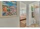 Ensuite bathroom and bedroom with natural light, neutral walls, and light pink accents at 239 N Bruce St, Las Vegas, NV 89101