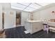 Bright bathroom featuring black tile floors, double sinks, and a walk in shower at 2401 Windjammer Way, Las Vegas, NV 89107