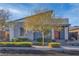 Contemporary home exterior features desert landscaping and an eye-catching architectural design at 2494 Veronella St, Henderson, NV 89044