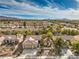 Lovely single-story home featuring a three-car garage, beautiful landscaping, and a tile roof at 2581 Terrytown Ave, Henderson, NV 89052