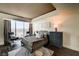 Expansive bedroom with incredible city views from the large picture window and dark wood floors at 2700 Las Vegas Blvd # 4109, Las Vegas, NV 89109
