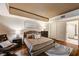 Well-furnished bedroom with dark wood floors, a luxurious bed, and an ensuite bathroom at 2700 Las Vegas Blvd # 4109, Las Vegas, NV 89109