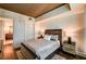 Comfortable bedroom featuring a queen bed, stylish nightstands, and access to an ensuite bathroom at 2700 Las Vegas Blvd # 4109, Las Vegas, NV 89109