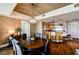 Open-concept dining area with a modern chandelier and bar seating at the kitchen counter at 2700 Las Vegas Blvd # 4109, Las Vegas, NV 89109