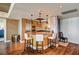 Modern kitchen features an island with granite countertop, wooden cabinets, and bar stool seating at 2700 Las Vegas Blvd # 4109, Las Vegas, NV 89109