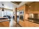 Open concept kitchen featuring built-in appliances and island overlooking the dining area with a view at 2700 Las Vegas Blvd # 4109, Las Vegas, NV 89109