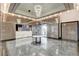 Sophisticated lobby featuring marble floors, a modern chandelier, and concierge desk at 2700 Las Vegas Blvd # 4109, Las Vegas, NV 89109