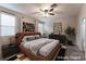 Spacious primary bedroom with natural light, fan and stylish decor at 361 Black Turnstone Ct, Las Vegas, NV 89138