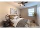 Cozy bedroom featuring a comfy bed, stylish furnishings, and plenty of natural light at 361 Black Turnstone Ct, Las Vegas, NV 89138