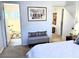 Hallway with a view of the bathroom and a bedroom, featuring an upholstered bench at 3999 Delos Dr, Las Vegas, NV 89103