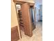 Kitchen with stainless fridge hidden by panel features abundant cabinet space and natural light at 3999 Delos Dr, Las Vegas, NV 89103