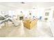 Bright, open living room featuring stone fireplace, large windows and comfortable seating at 3999 Delos Dr, Las Vegas, NV 89103
