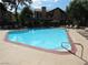 Sparkling community pool provides a refreshing oasis with lounge chairs and shade at 3999 Delos Dr, Las Vegas, NV 89103