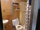 A bathroom with toilet and shower/tub combination at 4200 Coran Ln, Las Vegas, NV 89108