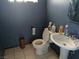 A bathroom with toilet and sink at 4200 Coran Ln, Las Vegas, NV 89108