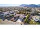An aerial view of a single Gathering home with a large driveway in a residential area at 4245 N Campbell Rd, Las Vegas, NV 89129