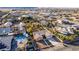 Aerial view of a home with a in-ground pool, palm trees and desert landscaping at 4245 N Campbell Rd, Las Vegas, NV 89129