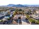 An aerial view of a home with an in-ground pool in a suburban neighborhood at 4245 N Campbell Rd, Las Vegas, NV 89129