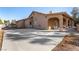 The rear exterior shows a large, covered patio area and a vast concrete space at 4245 N Campbell Rd, Las Vegas, NV 89129