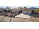 Charming single-story home with a three-car garage, desert landscaping, and mountain views in a serene setting at 4245 N Campbell Rd, Las Vegas, NV 89129