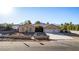 Charming single-story home with a three-car garage, desert landscaping, and mountain views in a serene setting at 4245 N Campbell Rd, Las Vegas, NV 89129