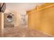 Open-concept living room featuring tile floors, neutral paint and natural light at 4245 N Campbell Rd, Las Vegas, NV 89129