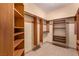 Organized walk-in closet with shelves and hanging rods providing ample storage space at 4245 N Campbell Rd, Las Vegas, NV 89129