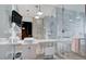 Contemporary bathroom with marble surfaces, double sinks, and a large walk-in shower at 4381 W Flamingo Rd # 3007, Las Vegas, NV 89103
