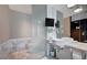 Modern bathroom with marble finishes, double sinks, and a glass-enclosed shower at 4381 W Flamingo Rd # 3007, Las Vegas, NV 89103