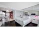 Contemporary bedroom boasts a king-sized bed and views into the kitchen at 4381 W Flamingo Rd # 3007, Las Vegas, NV 89103
