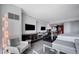 Open-concept living space with work station and views to the kitchen at 4381 W Flamingo Rd # 3007, Las Vegas, NV 89103