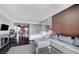 Open living space with sofa, bed and kitchen area with city views at 4381 W Flamingo Rd # 3007, Las Vegas, NV 89103