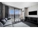 Living room with modern decor, comfortable seating, and scenic city views at 4381 W Flamingo Rd # 3007, Las Vegas, NV 89103