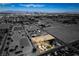 Aerial view of property highlighting pool, mature trees and proximity to the city at 4530 W Maulding Ave, Las Vegas, NV 89139