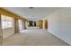 Spacious and open living area with archways, fireplace, and backyard views at 4530 W Maulding Ave, Las Vegas, NV 89139